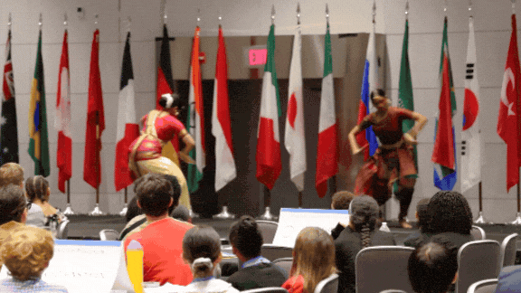 DCPS students watch dancers perform during an event at the Ronald Reagan building.
